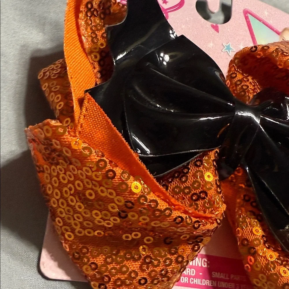 JoJo Siwa Sparkling Orange Hair Bow with Black Center